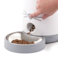 Catit Pixi Smart Feeder -PetJoy Shop 43752 catit pixi smart feeder pushing nose 1